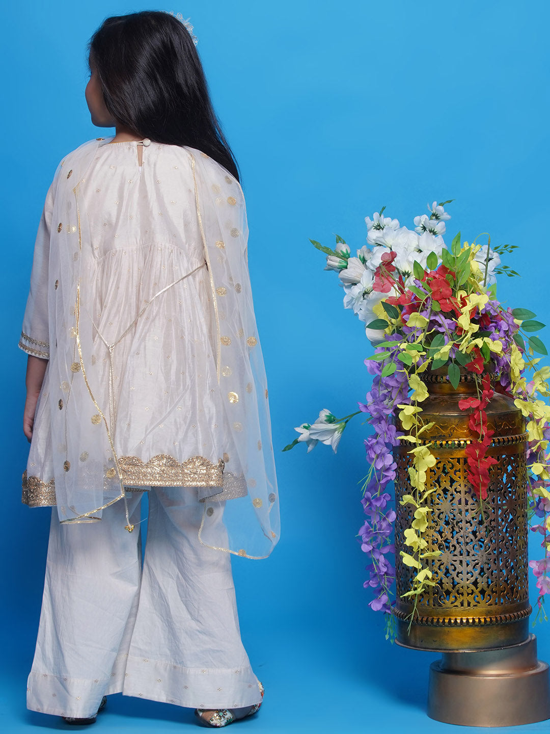 Stylish creme silk Indian dress girls. Ideal Indian kidswear for Diwali, Hindu festivals & wedding occasions in Canada.
