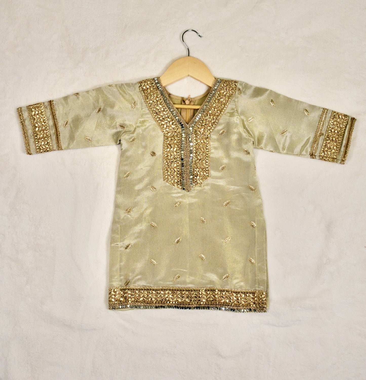 Shop this golden tissue Gharara kameez with net dupatta. Perfect dress for Indian/Pakistani festivals & wedding outfit.