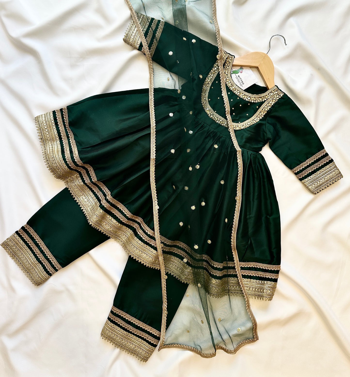Green Indian dress for girls made in soft silk fabric. Ships from Guelph