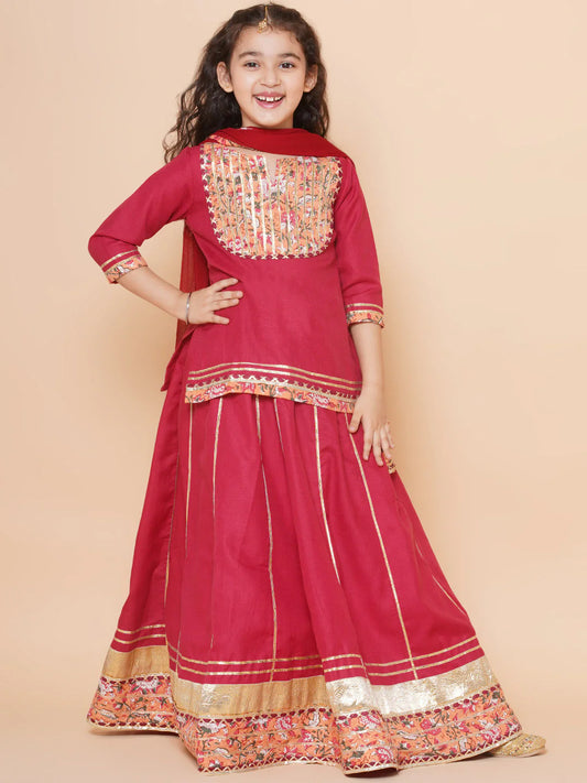Elegant maroon lehenga choli with dupatta for girls, ages toddler to teen—traditional design perfect for weddings and festivals.