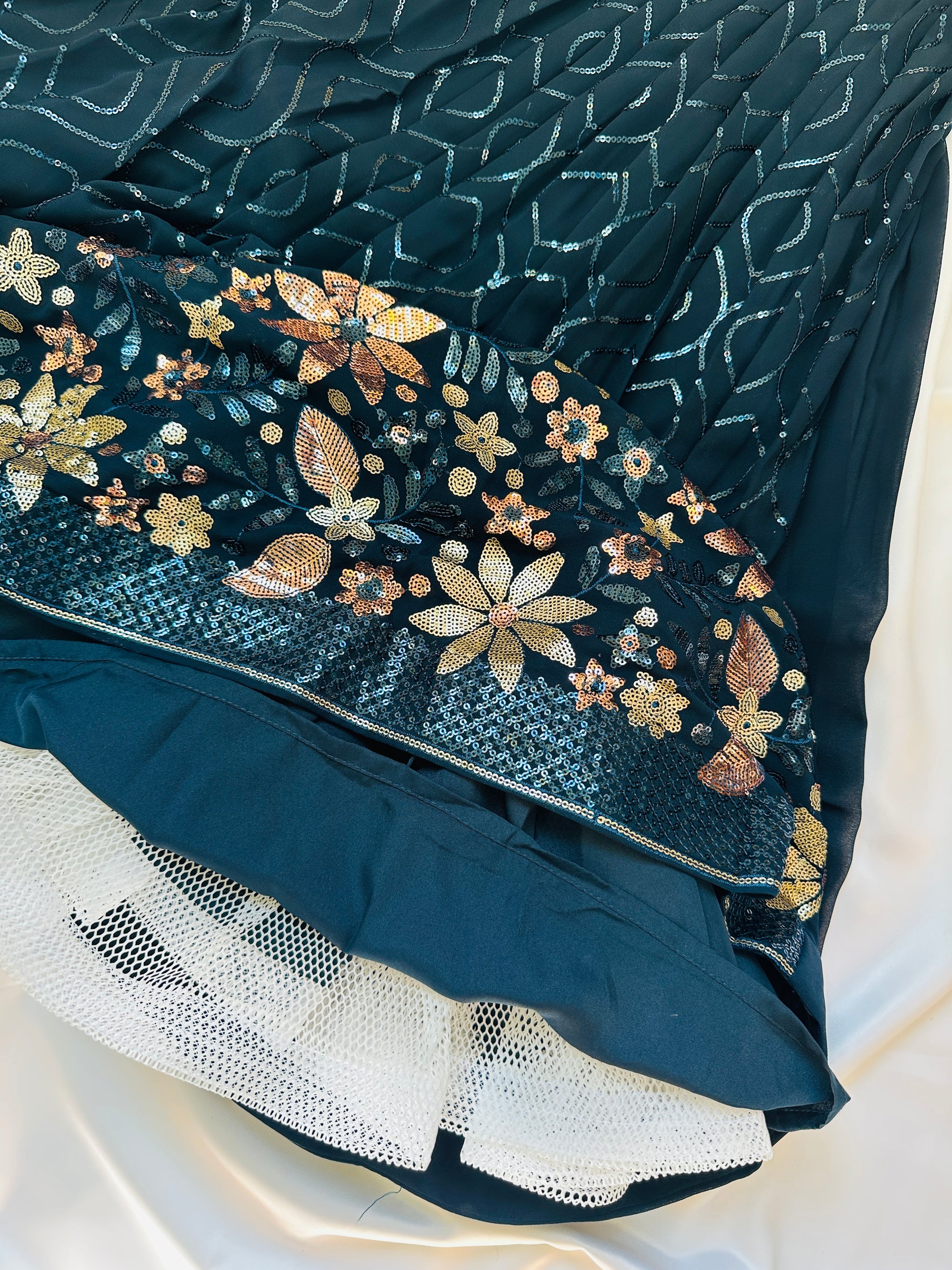 Navy blue fabric with floral embroidery and casement & lining.